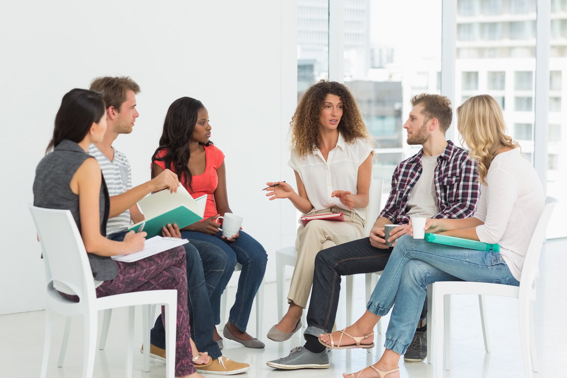 Therapist speaking to a rehab group